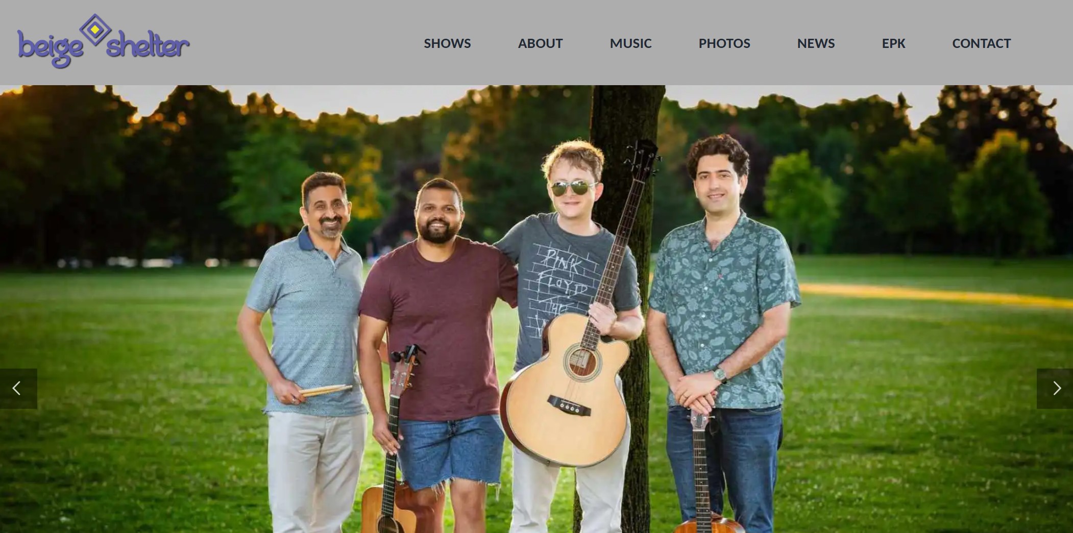 Beige Shelter webpage with photo of the band posing outdoors with their instruments - Neel, Adi, Tom, and Ben